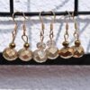 Hand Engraved Opulent gold engraved drop earrings - Image 2